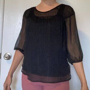 Sheer flowing black top